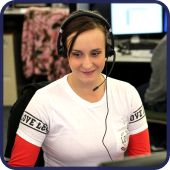 Etech contact center agent wearing a headset while assisting a customer